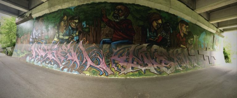 A panoramic view of the Hug Bx mural.