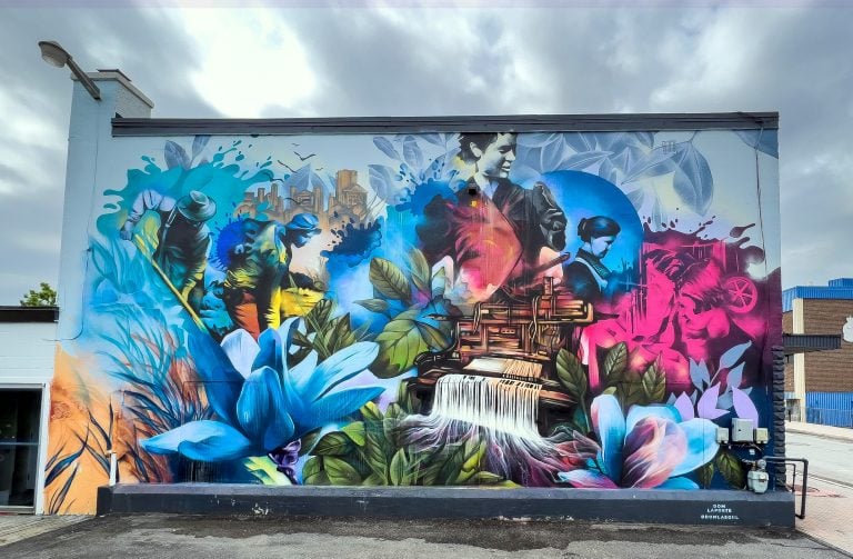 The 'When Generations Connect' mural, seen from the street.