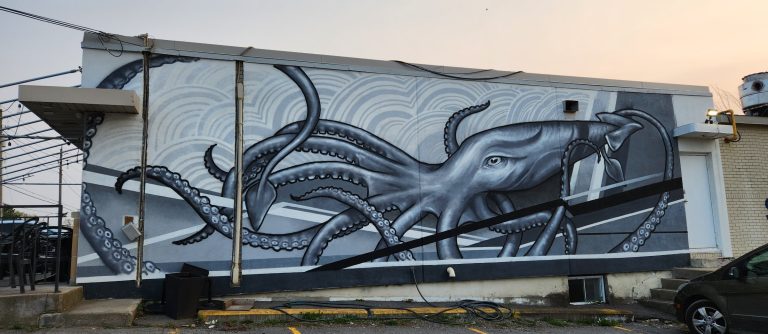 A giant squid painted on the side of Merivale Fish Market