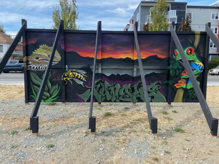 This image shows the completed mural "Jungle" by Dave H.