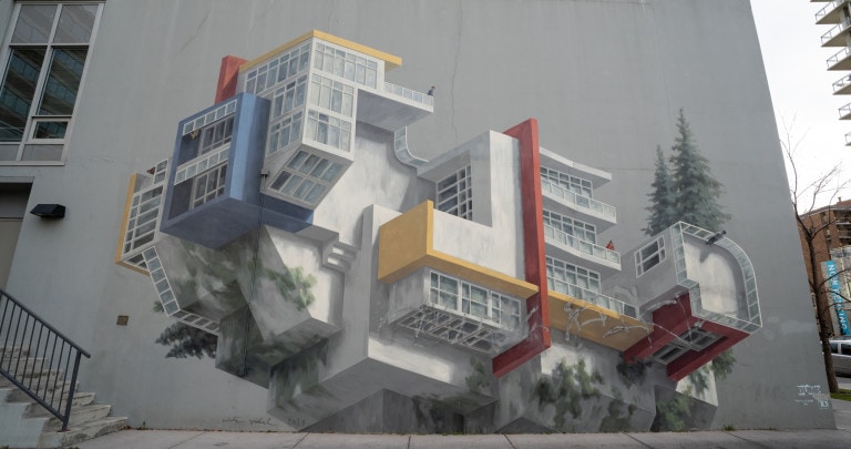 Abstract building with trees under the cement and on the roof.