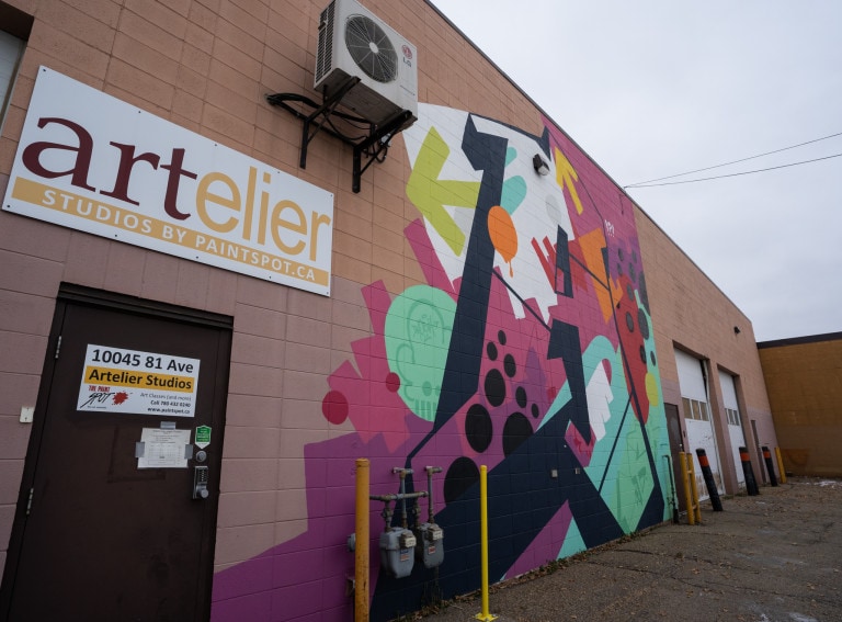 Large letter "A" with spots, abstract lines, and colour.